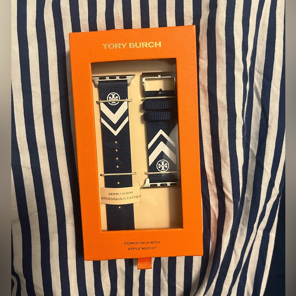 Brand new Tory Burch Apple Watch band. Fits size 38mm/40mm watch. Navy and white